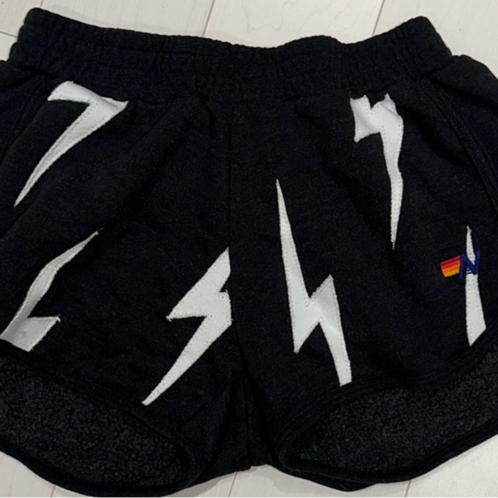Aviator Nation Black Shorts with White Lightning Design